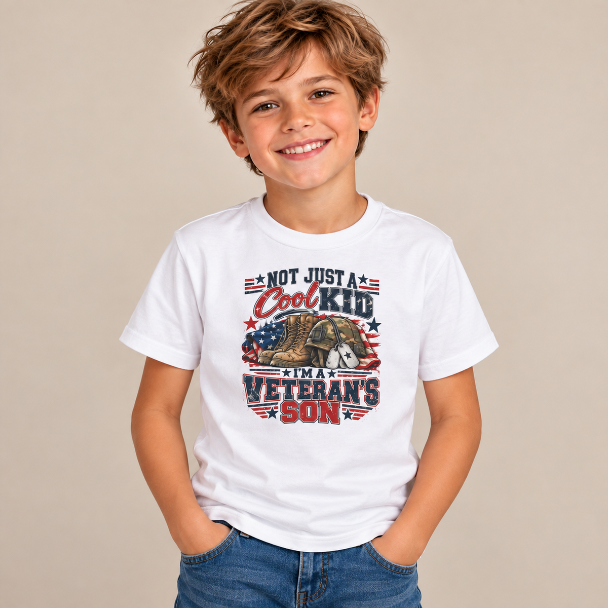 Boy wearing the White Not Just A Cool Kid I'm A Veteran's Son Kids T-Shirt with jeans