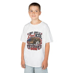 Boy wearing the white Not Just A Cool Kid I'm A Veteran's Son Kids T-Shirt