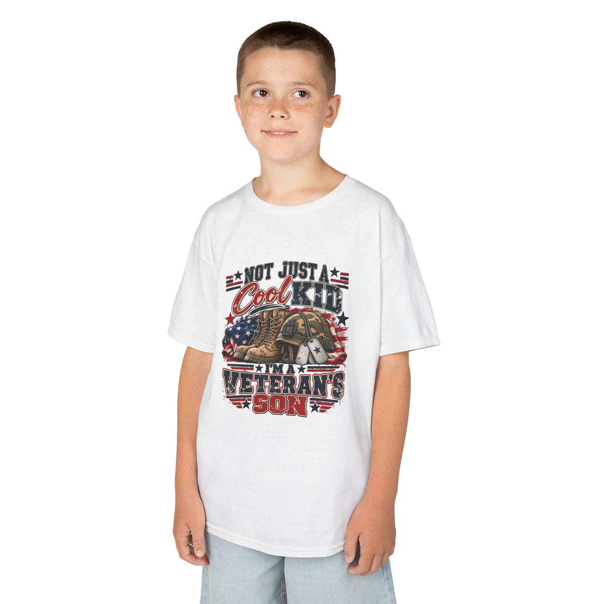 Boy wearing the white Not Just A Cool Kid I'm A Veteran's Son Kids T-Shirt