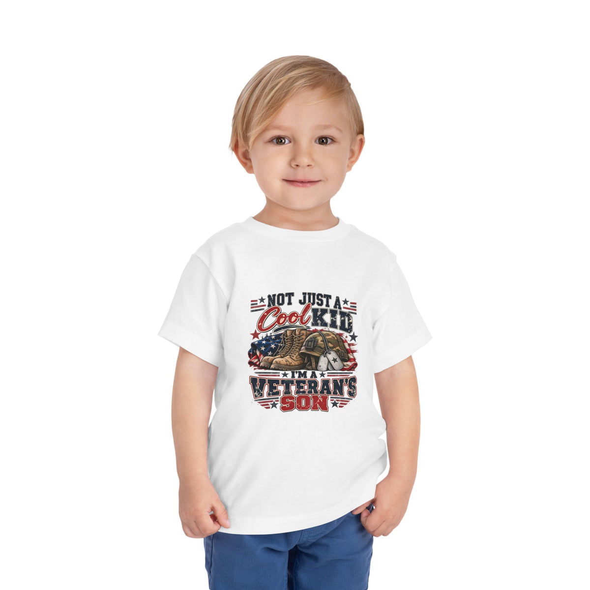 Toddler wearing the white Not Just A Cool Kid I'm A Veteran's Son Toddler T-Shirt