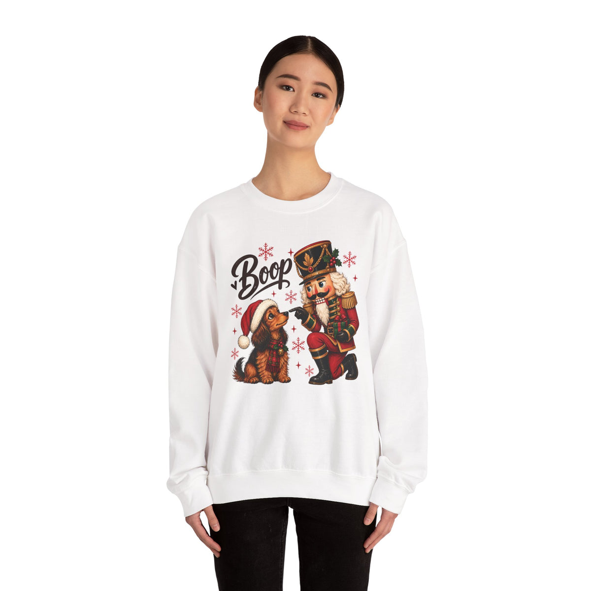 Model wearing the white Nutcracker Dachshund Boop Christmas Sweatshirt