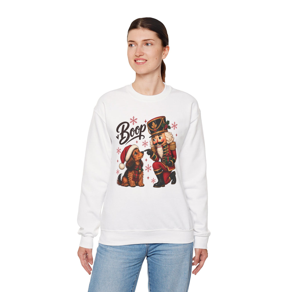 Model wearing the white Nutcracker Dachshund Boop Christmas Sweatshirt