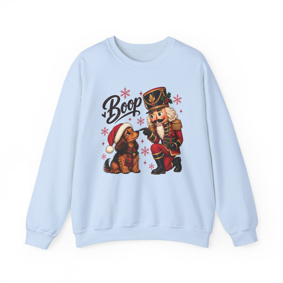 Light Blue Nutcracker Dachshund Boop Christmas sweatshirt with a nutcracker soldier booping the nose of a dachshund in a Santa hat, front view