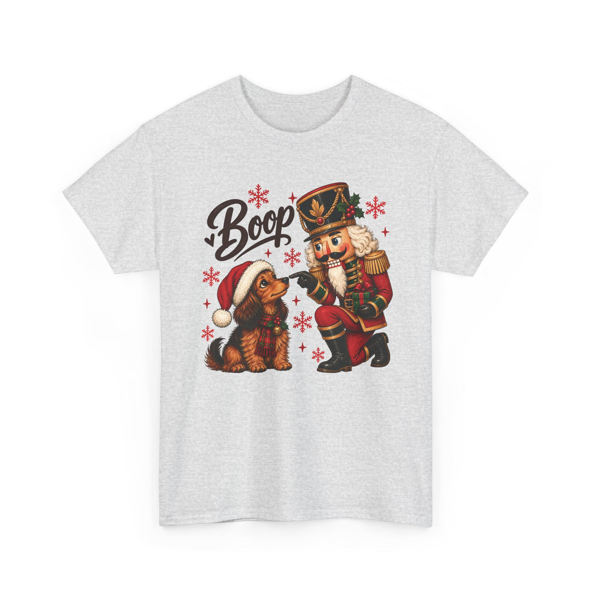 Ash Nutcracker Dachshund Boop Christmas t-shirt with a nutcracker soldier booping the nose of a dachshund in a Santa hat, front view