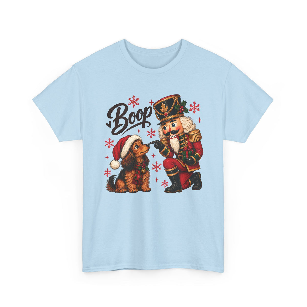 Light Blue Nutcracker Dachshund Boop Christmas t-shirt with a nutcracker soldier booping the nose of a dachshund in a Santa hat, front view