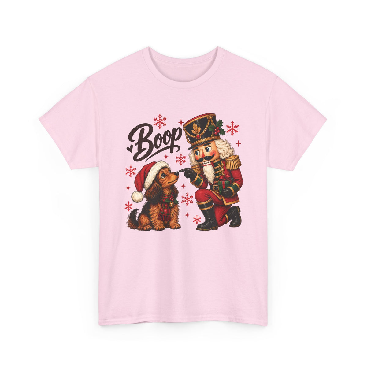 Light Pink Nutcracker Dachshund Boop Christmas t-shirt with a nutcracker soldier booping the nose of a dachshund in a Santa hat, front view