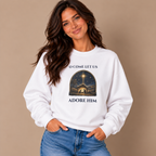 Woman wearing the White O Come Let Us Adore Him Christian Christmas Sweatshirt with jeans