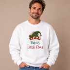 Man wearing the White Papa's Little Elves Sweatshirt with jeans