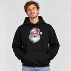 Man wearing the black Pink Retro Christmas Santa Hoodie with jeans