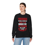 Woman wearing the Protected By A Smokin' Hot Veteran warning sweatshirt, alternative view