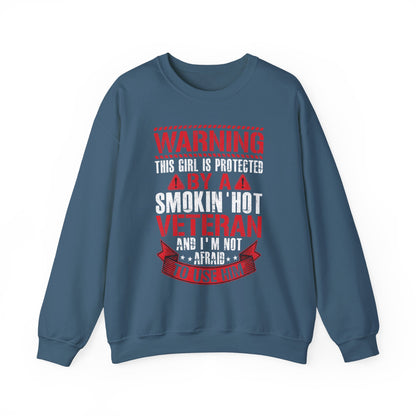 Indigo blue Protected By A Smokin' Hot Veteran sweatshirt with red and white warning lettering