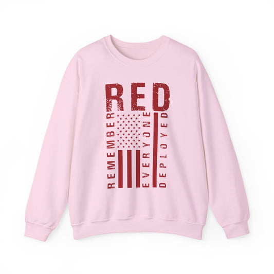 Light pink RED remember everyone deployed sweatshirt with distressed American flag print, front view