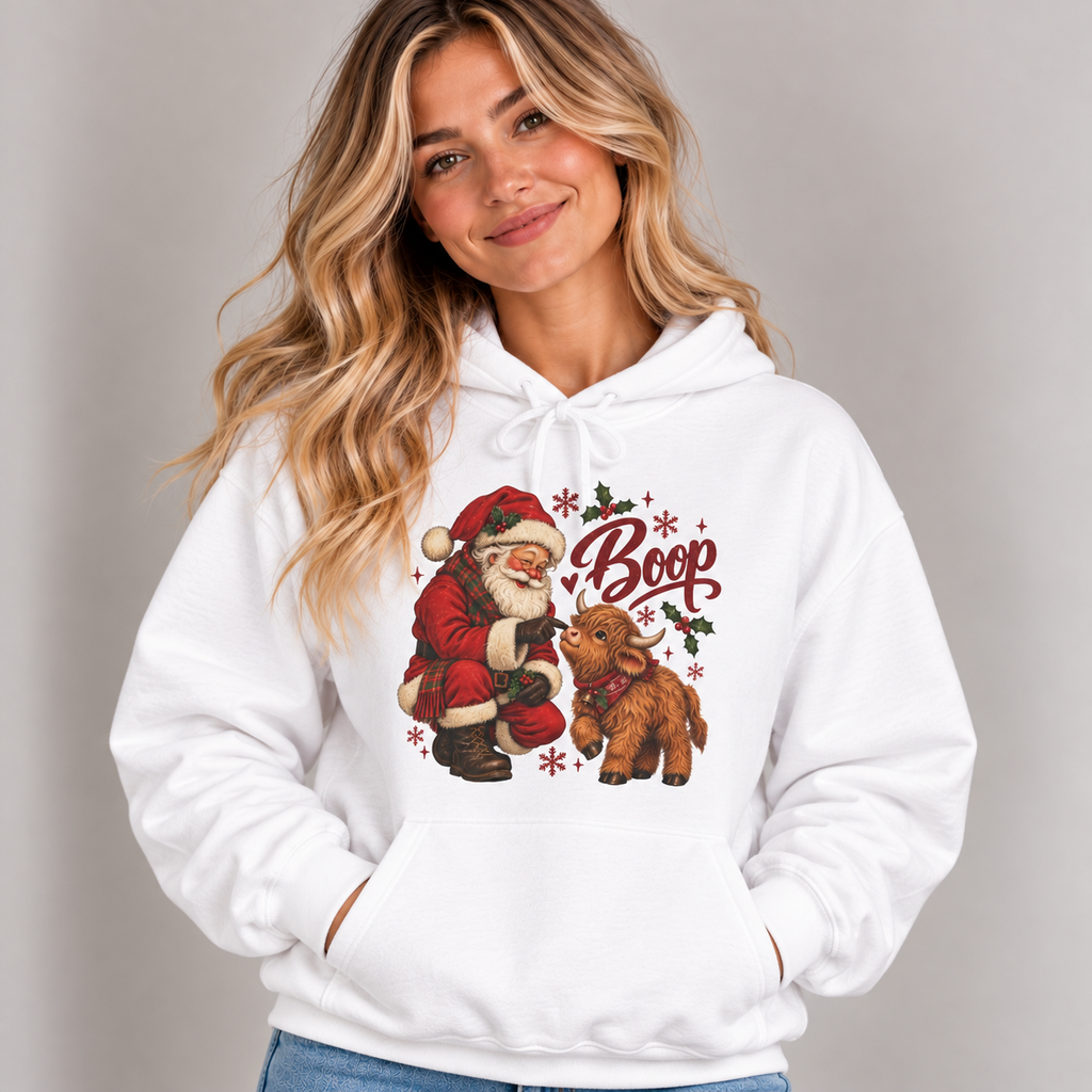 Woman wearing the White Santa Boop Highland Cow Hoodie with jeans