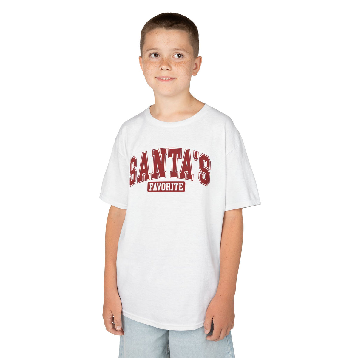 Boy wearing the White Santa's Favorite Varsity Christmas Kids T-Shirt, front view