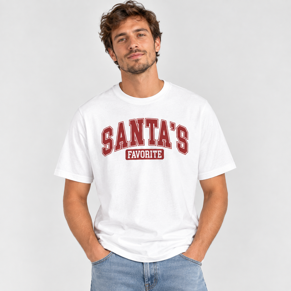 Man wearing the White Santa's Favorite Varsity Christmas T-Shirt with jeans