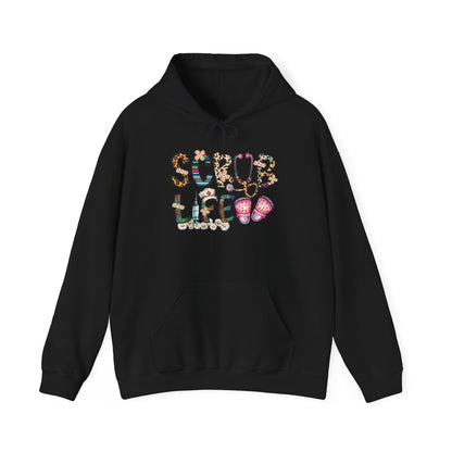 Black Scrub Life nurse hoodie with patterned lettering, stethoscope and clogs