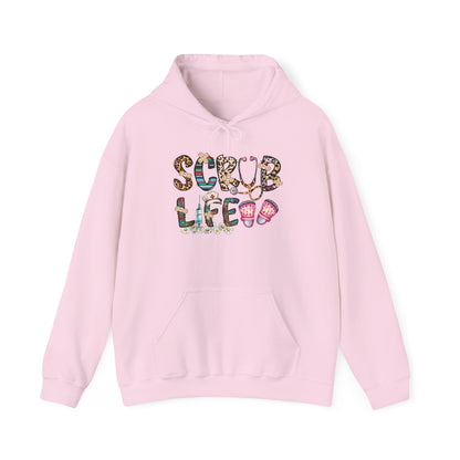 Light pink Scrub Life nurse hoodie with patterned lettering, stethoscope and clogs