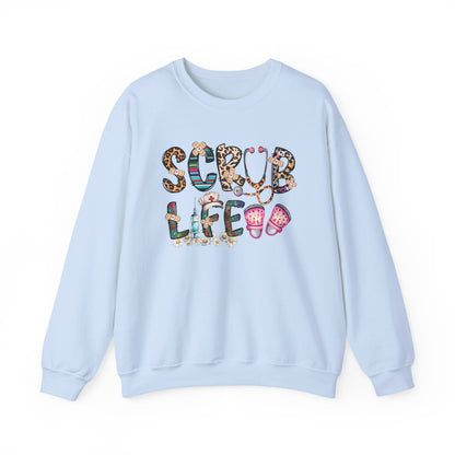 Light blue Scrub Life nurse sweatshirt with patterned lettering, stethoscope and clogs