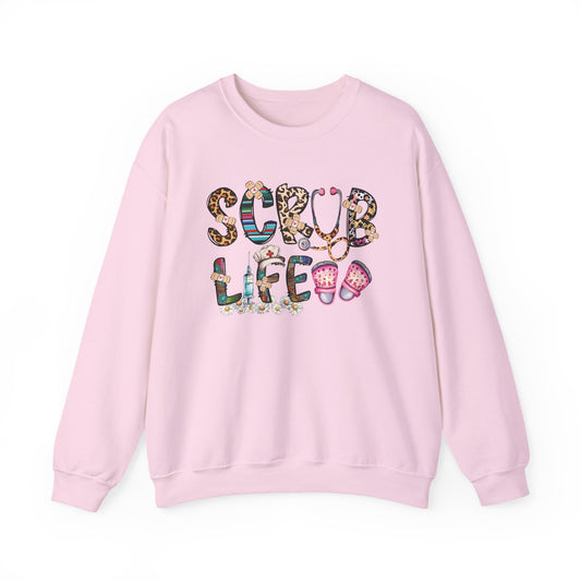 Light pink Scrub Life nurse sweatshirt with patterned lettering, stethoscope and clogs