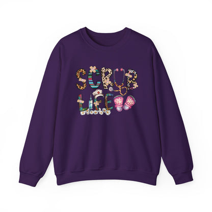 Purple Scrub Life nurse sweatshirt with patterned lettering, stethoscope and clogs