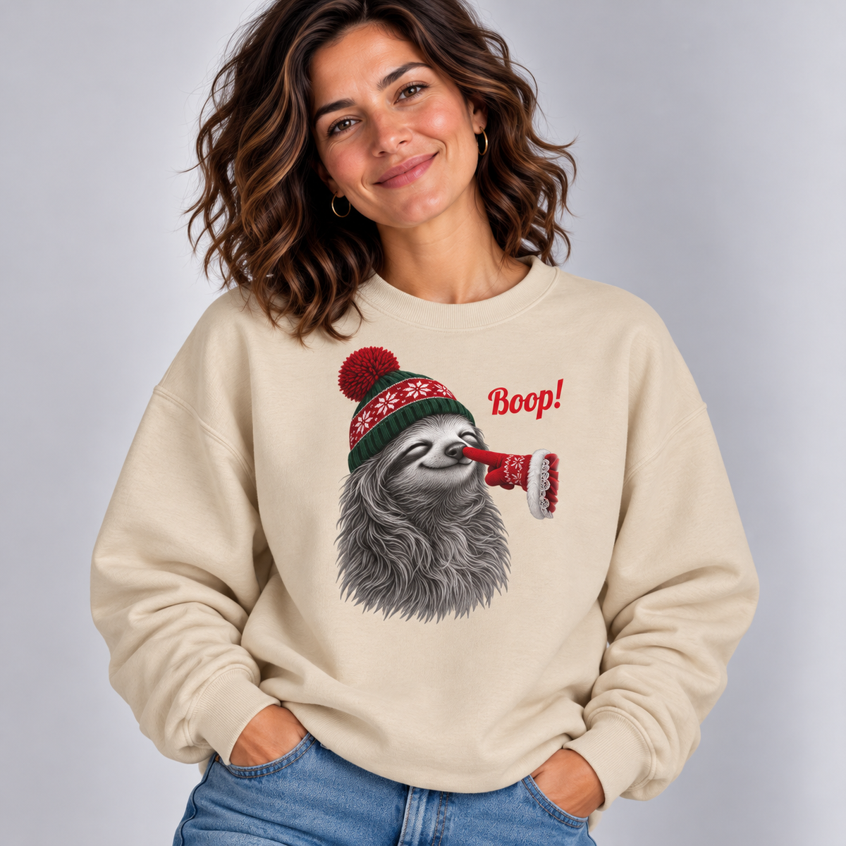 Woman wearing the Sand Sloth Boop Christmas Sweatshirt with jeans