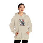 Woman wearing the Sand Sorry Santa I've Been Feral Raccoon Hoodie