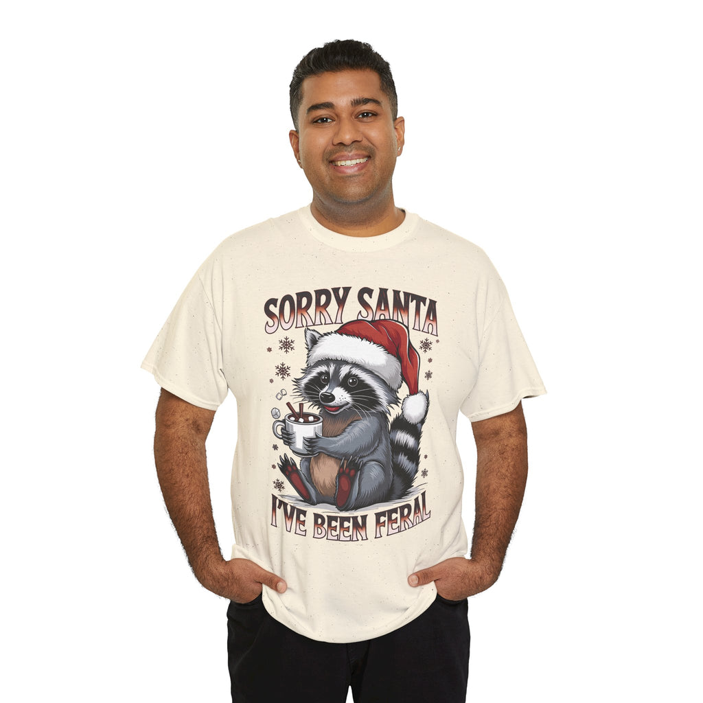 Man wearing the Natural Sorry Santa I've Been Feral Raccoon T-Shirt