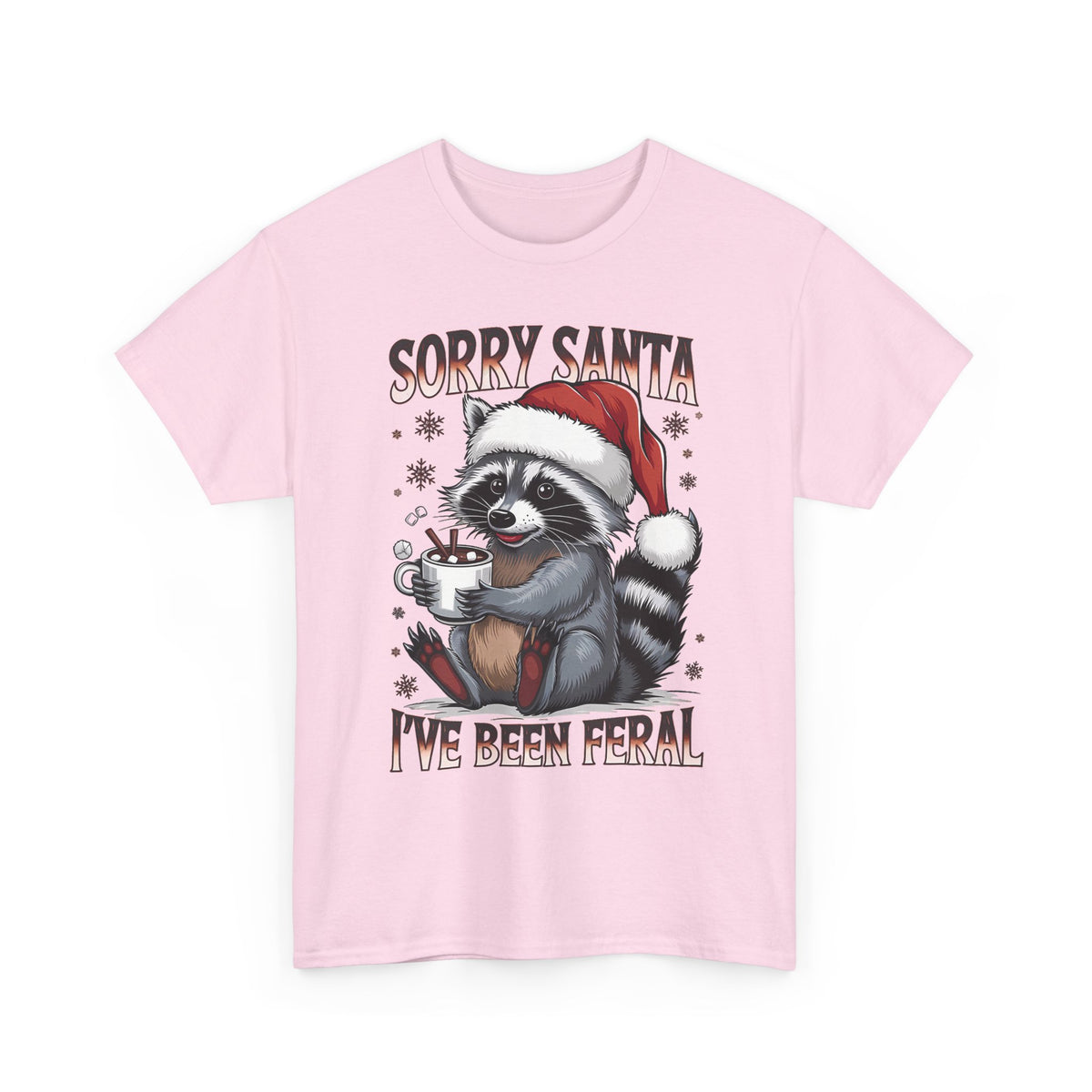 Light Pink Sorry Santa I've Been Feral t-shirt with a Santa hat raccoon holding hot cocoa, front view