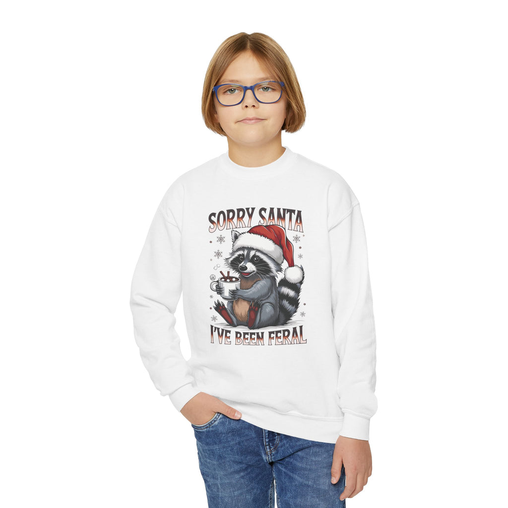 Child wearing the white Sorry Santa I've Been Feral Raccoon Youth Sweatshirt