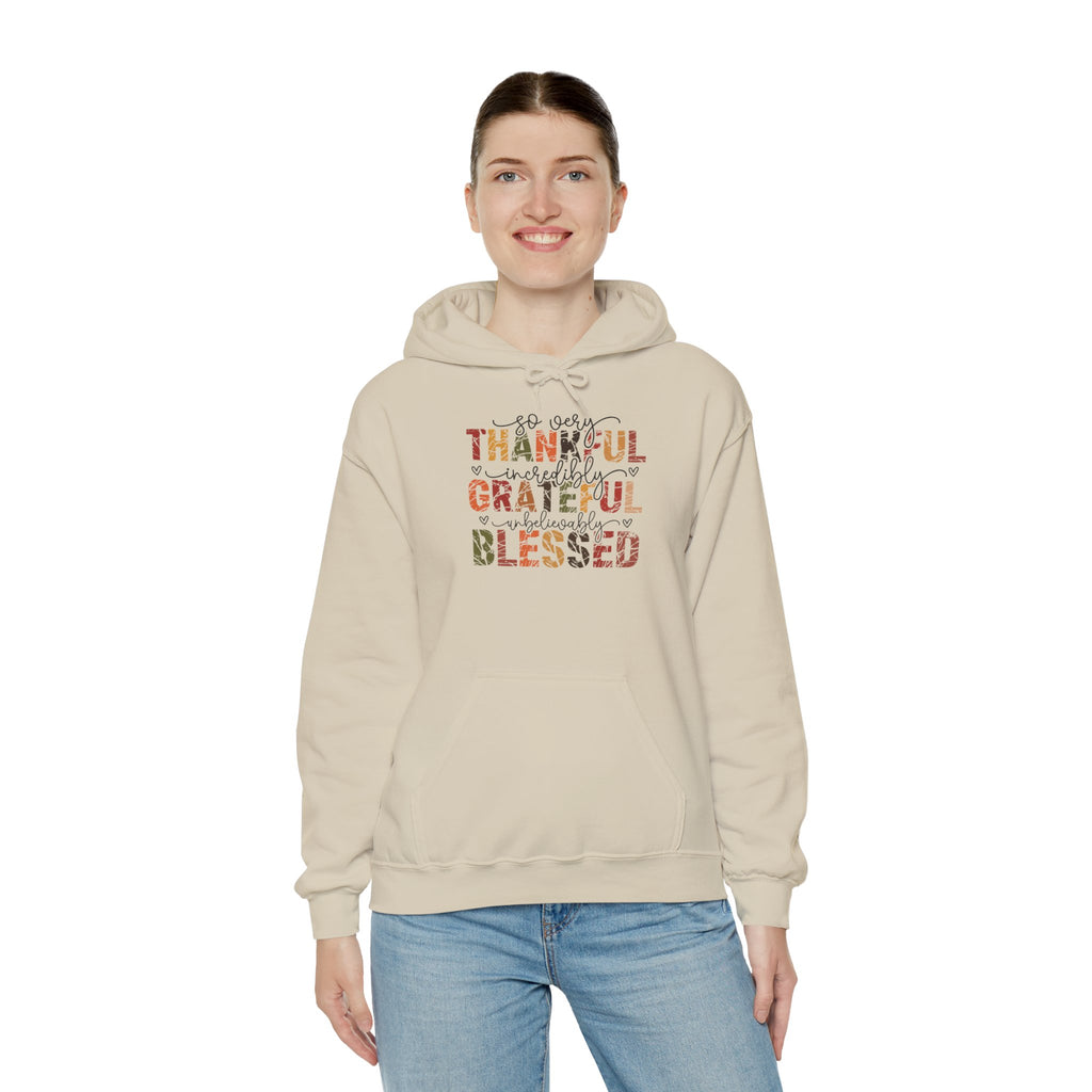 Model wearing the sand Thankful Grateful Blessed Hoodie