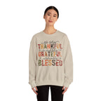 Model wearing the sand Thankful Grateful Blessed Sweatshirt