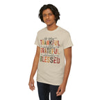 Model wearing the sand Thankful Grateful Blessed T-Shirt