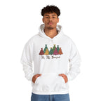 Model wearing the white Tis The Season Christmas Trees Hoodie