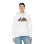 Model wearing the white Tis The Season Christmas Trees Hoodie