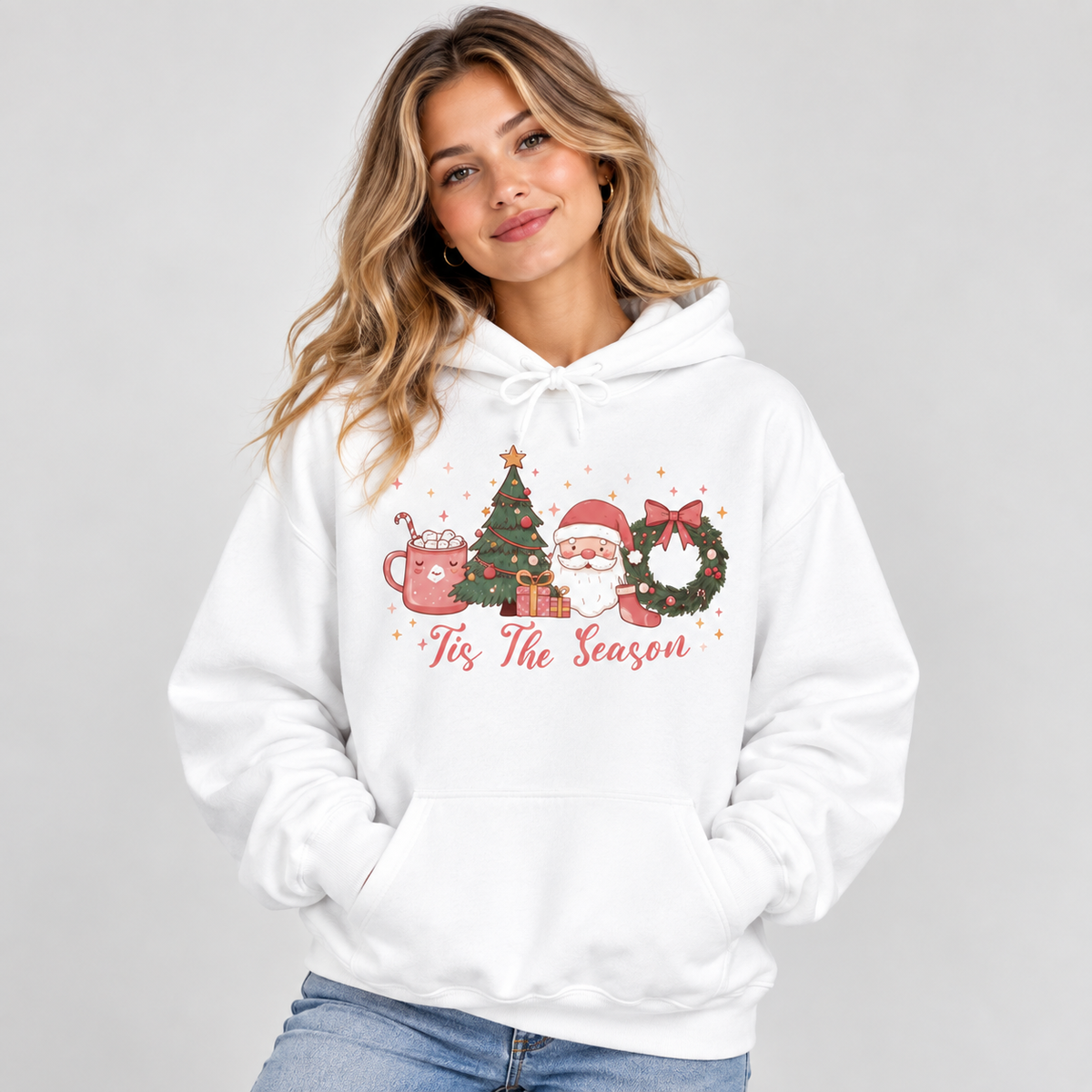 Woman wearing the Tis The Season Cute Christmas Hoodie with jeans
