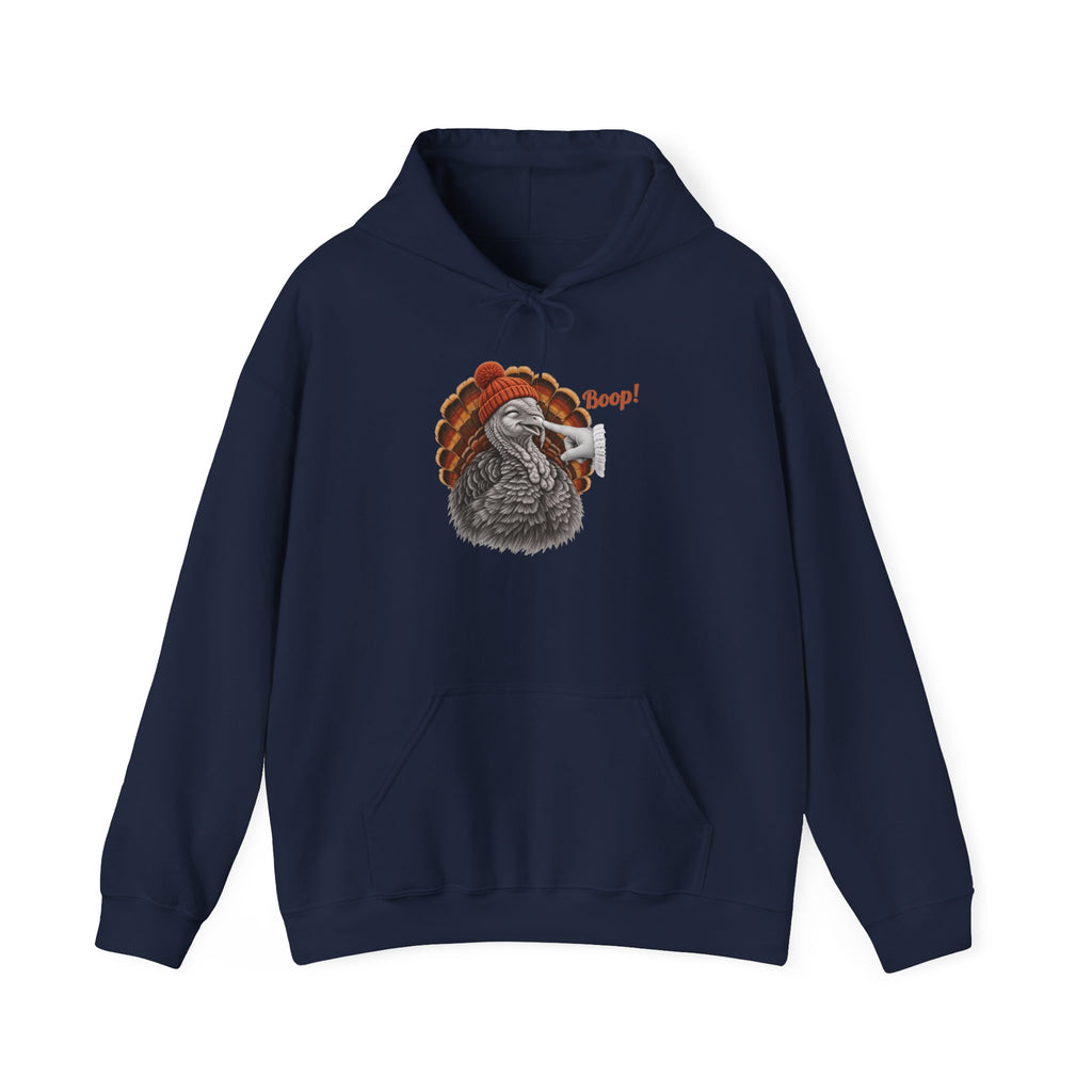 Navy Turkey Boop Thanksgiving hoodie with a smiling turkey in an orange knit beanie getting a boop on the beak, front view