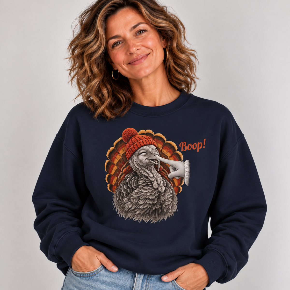 Woman wearing the Navy Turkey Boop Thanksgiving Sweatshirt with jeans