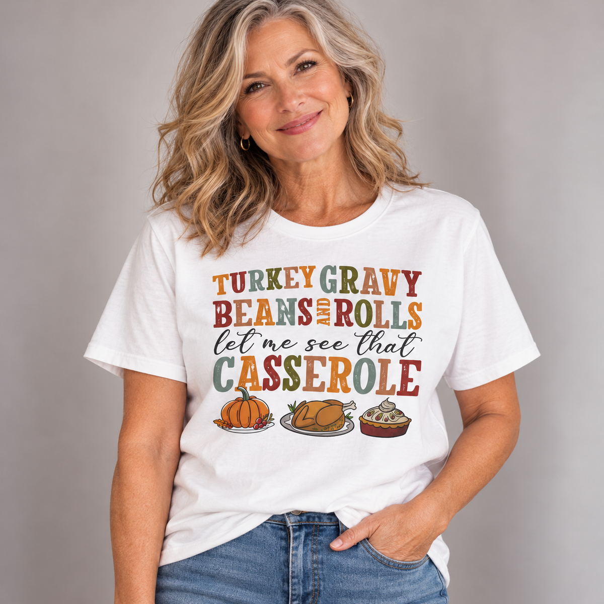 Woman wearing the White Turkey Gravy Beans and Rolls T-Shirt with jeans