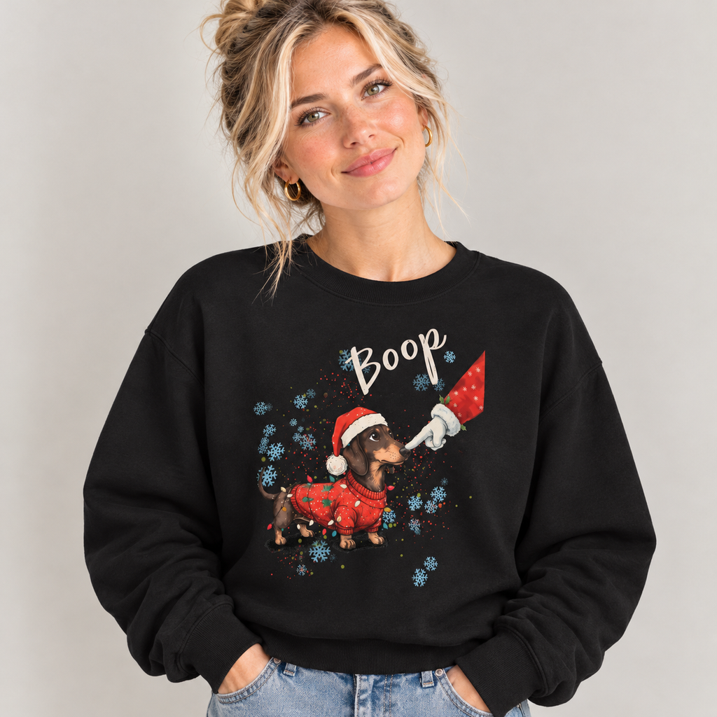 Woman wearing the Black Wiener Dog Boop Christmas Sweatshirt with jeans