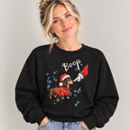 Woman wearing the Black Wiener Dog Boop Christmas Sweatshirt with jeans