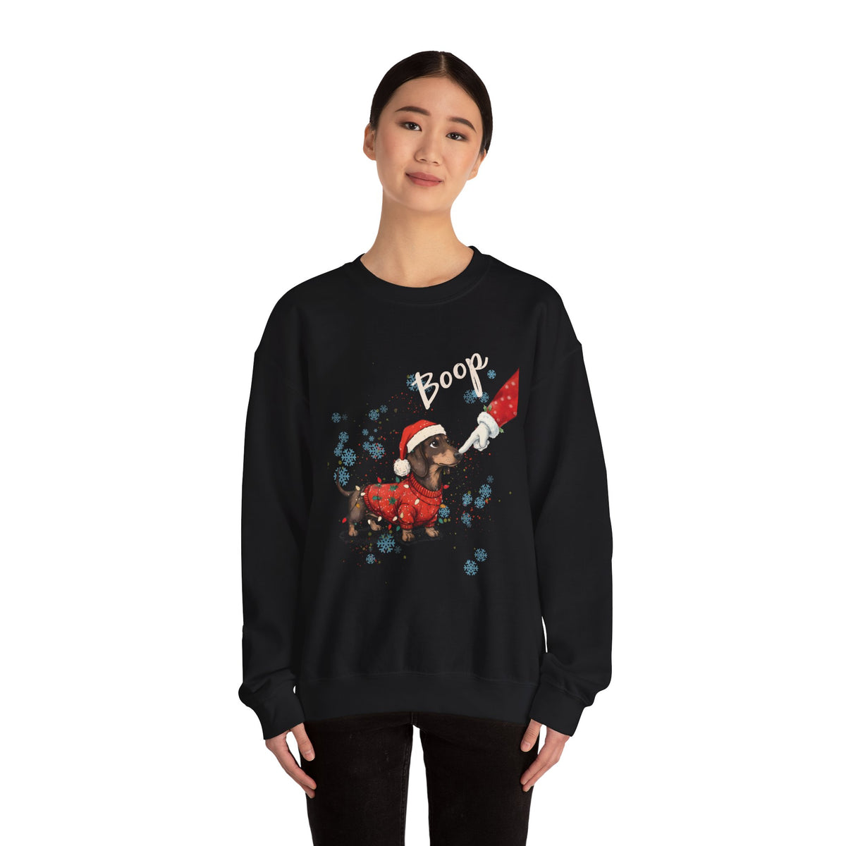 Model wearing the black Wiener Dog Boop Christmas Sweatshirt