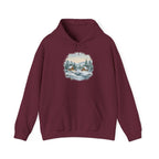 Maroon Winter Wonderland hoodie with a watercolor snowy cabin scene, pine trees and a frozen creek, front view