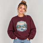 Woman wearing the Maroon Winter Wonderland Snowy Cabin Sweatshirt with jeans