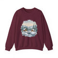 Maroon Winter Wonderland sweatshirt with a watercolor snowy cabin scene, pine trees and a frozen creek, front view